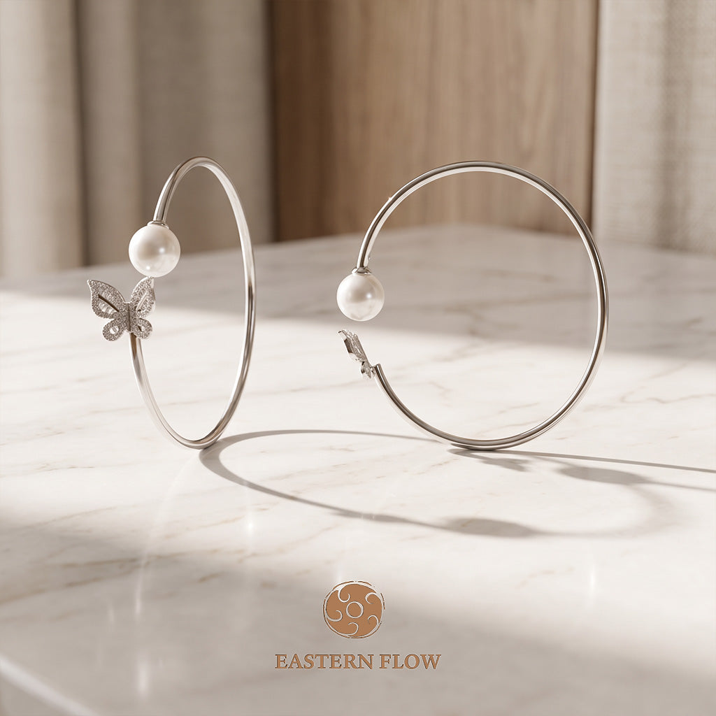 The Flow of Metal: Natural Freshwater Pearl Butterfly Bangle