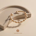 The Flow of Metal: Handwoven Pearl Wire Cuff Bangle