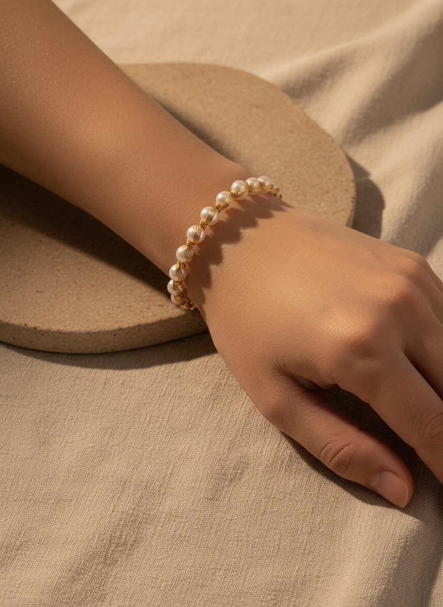 The Flow of Metal: Handwoven Alloy & Freshwater Pearl Bangle