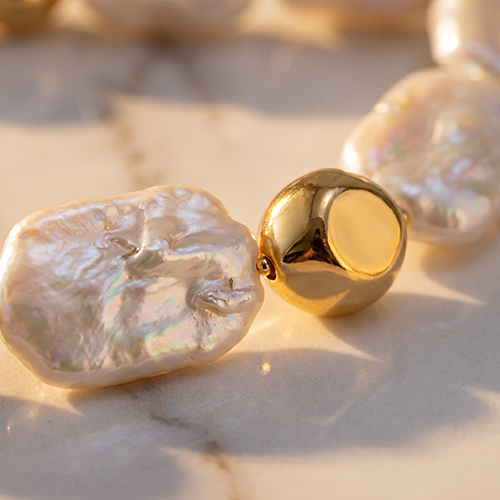 The Flow of Metal: Natural Freshwater Baroque Pearl Necklace