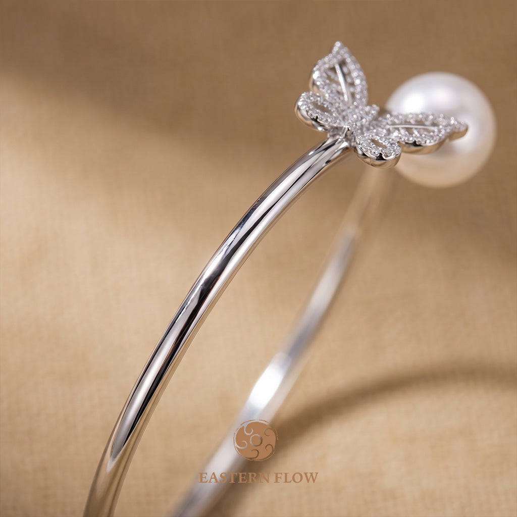The Flow of Metal: Natural Freshwater Pearl Butterfly Bangle
