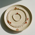 The Flow of Fire: Natural Freshwater Pearl Necklace & Bracelet Set