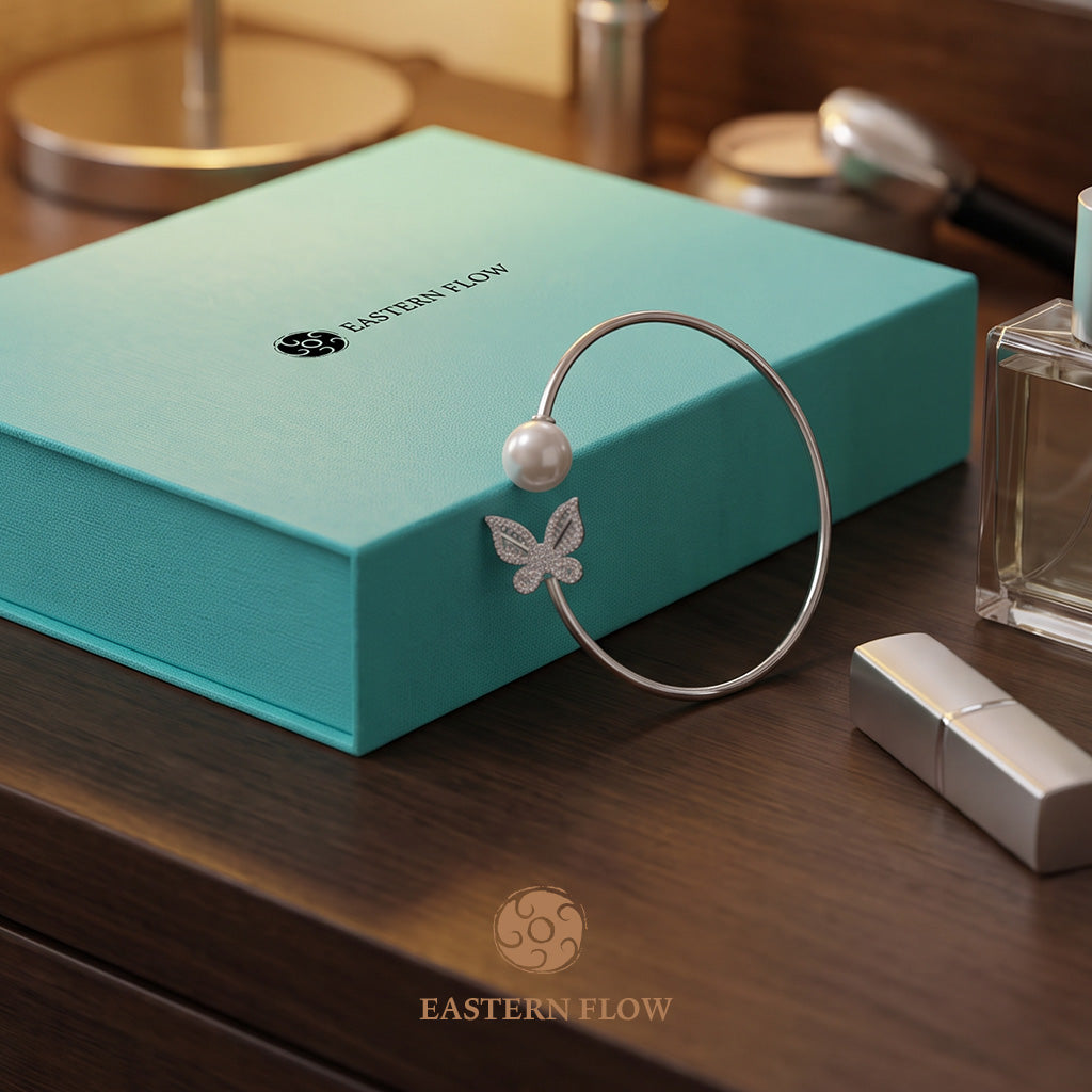 The Flow of Metal: Natural Freshwater Pearl Butterfly Bangle
