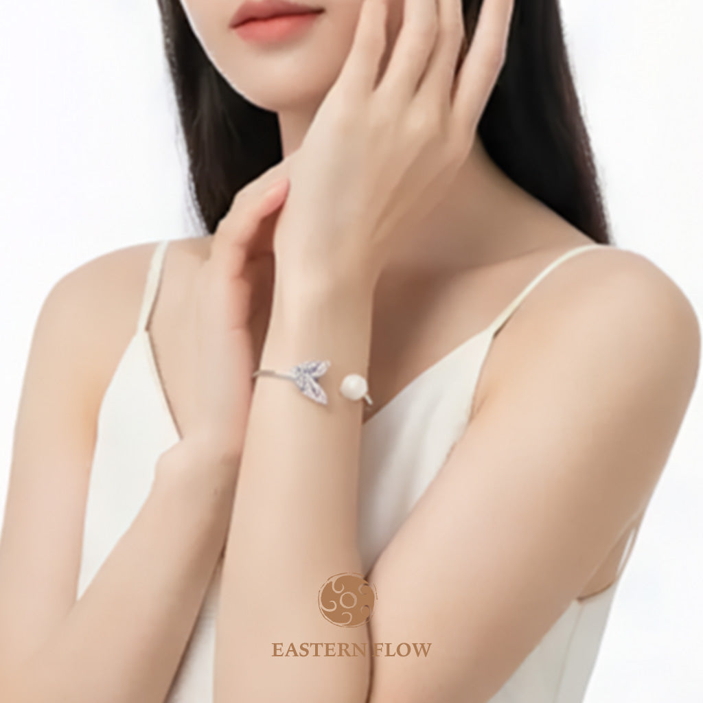 The Flow of Metal: Natural Freshwater Pearl Butterfly Bangle