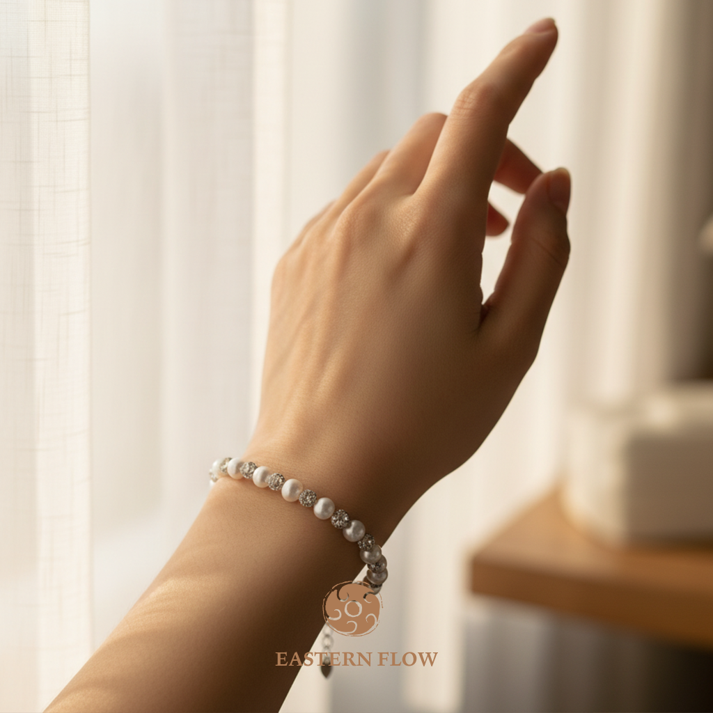 Freshwater pearl bracelet wrist shot, Metal Element energy for decisive executives - Eastern Flow