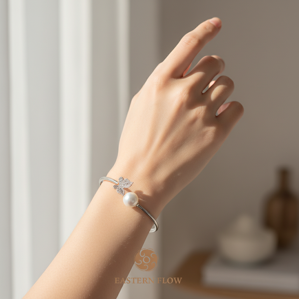 Pearl butterfly bangle wrist shot, Metal Element energy for decisive executives - Eastern Flow